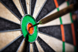 Dart in a Bullseye - Agile coaching isn’t about agility for its own sake—it’s about hitting the target: customer value, innovation, and sustainable business success.