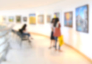 Blurry photo of people(?) in an art gallery(?)