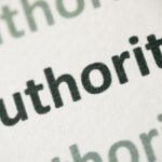 The word "authority" printed on paper