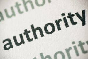 The word "authority" printed on paper