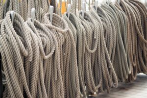 Ship ropes laid on the deck of a sailboat